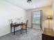 Home office featuring a desk, chair, and window with natural light at 14432 Orchid Island Dr, Orlando, FL 32827