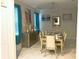 Elegant dining room featuring a modern table, seating for eight, and decorative accents at 1584 Plunker Dr, Davenport, FL 33896