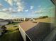 View of neighborhood homes, blue skies, and lush green lawns at 15872 Moonlight Bay St, Winter Garden, FL 34787
