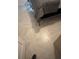 Neutral tile bedroom floor with a bed in the background at 1924 Piedmont Ct, Mascotte, FL 34753