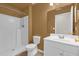 Functional bathroom with shower, toilet, and vanity with mirror and sink at 205 Twisting Trl, Orlando, FL 32825