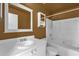 Standard bathroom featuring a white vanity, toilet, tub, and neutral wall color scheme at 205 Twisting Trl, Orlando, FL 32825