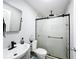 Updated bathroom with a modern vanity and glass-enclosed shower at 2342 Linda St, Lake Wales, FL 33898