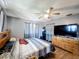 Cozy bedroom features a ceiling fan and spacious layout at 2342 Linda St, Lake Wales, FL 33898