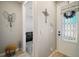 Inviting foyer with a view into the living room at 2451 Spring Breeze Dr, Leesburg, FL 34748