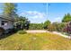 Well-maintained backyard with a brick patio and lush greenery, perfect for outdoor entertaining at 2545 Dellwood Dr, Orlando, FL 32806