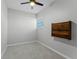 Bedroom with carpet, wall cabinet, ceiling fan and window with blinds at 2545 Dellwood Dr, Orlando, FL 32806