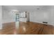 Bright living room with hardwood floors and ample natural light, creating an inviting and spacious atmosphere at 2545 Dellwood Dr, Orlando, FL 32806