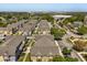 Gorgeous aerial view of community townhomes and manicured landscaping at 2624 Lodi Cir # 101, Kissimmee, FL 34746