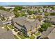 Picturesque aerial view showcases a well-planned community with lush landscaping, sidewalks and charming townhomes at 2624 Lodi Cir # 101, Kissimmee, FL 34746
