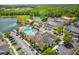 Aerial view of community pool, clubhouse, parking and grounds at 2624 Lodi Cir # 101, Kissimmee, FL 34746