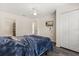 Comfortable bedroom with an en-suite bathroom and a large closet offering convenience and privacy at 2624 Lodi Cir # 101, Kissimmee, FL 34746