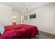Bedroom with a TV, ceiling fan, and a view of the en-suite bathroom at 2624 Lodi Cir # 101, Kissimmee, FL 34746