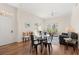 Inviting living room featuring hardwood floors, a ceiling fan, and comfortable seating at 2624 Lodi Cir # 101, Kissimmee, FL 34746