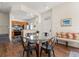 Inviting living room with a glass table, colorful pillows, and kitchen view at 2624 Lodi Cir # 101, Kissimmee, FL 34746