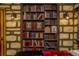 Charming bedroom with custom bookshelves and faux stone walls at 2805 Bookmark Dr, Kissimmee, FL 34746