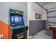 Entertainment garage with arcade game and Foosball at 2805 Bookmark Dr, Kissimmee, FL 34746