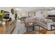 The open-concept living room is perfect for entertaining with view of kitchen and dining area at 2805 Bookmark Dr, Kissimmee, FL 34746