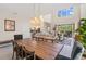 Bright, open-concept living room with high ceilings and view of the backyard at 2805 Bookmark Dr, Kissimmee, FL 34746
