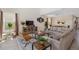 The living room shows an open-concept layout with views of the dining room and outdoor area at 2805 Bookmark Dr, Kissimmee, FL 34746