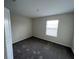 Carpeted bedroom featuring neutral walls and bright natural light at 2978 Aqua Virgo Loop # 13, Orlando, FL 32837