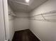 Walk-in closet with wire shelving and carpeted floor at 2978 Aqua Virgo Loop # 13, Orlando, FL 32837