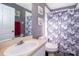 Bathroom with a vanity and framed mirror, along with a shower and tub combination at 3063 Jon Jon Ct, Orlando, FL 32822