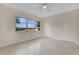 Bright bedroom with neutral walls, ceiling fan, and lots of natural light at 3107 Troy Dr, Orlando, FL 32806