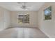 Bright bedroom with neutral walls and floors, and two windows at 3107 Troy Dr, Orlando, FL 32806