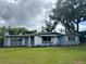 Inviting single-story home with freshly landscaped flower beds at 3107 Troy Dr, Orlando, FL 32806