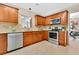 Traditional kitchen features wood cabinets, stainless steel appliances, and lots of counter space at 3107 Troy Dr, Orlando, FL 32806
