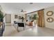 Bright living room with neutral tones, stylish decor, and lots of natural light from the expansive window at 3107 Troy Dr, Orlando, FL 32806