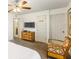 Bedroom featuring a TV, bamboo furniture, and neutral wall colors at 3132 Calabria Ave, Davenport, FL 33897