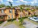 Well-maintained townhome with tropical landscaping and private driveway at 3132 Calabria Ave, Davenport, FL 33897