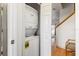White washer and dryer are conveniently located next to the stairs at 3132 Calabria Ave, Davenport, FL 33897