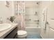 Cozy bathroom with tub and shower featuring nautical themed shower curtain at 3437 Possehl Pl, The Villages, FL 32163