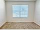 Neutral bedroom with carpet and white walls offering a serene space at 3437 Possehl Pl, The Villages, FL 32163