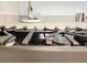 Close up of the kitchen range and countertop at 3437 Possehl Pl, The Villages, FL 32163