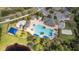 Aerial view of resort-style community pool area, play area, and ample seating at 3616 Deer Oak Cir, Oviedo, FL 32766
