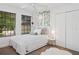 Serene bedroom with a comfortable bed, soft lighting, a window with blinds, and closet space for a relaxing ambiance at 3616 Deer Oak Cir, Oviedo, FL 32766