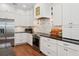 Bright kitchen with stainless steel appliances and white cabinets at 3616 Deer Oak Cir, Oviedo, FL 32766