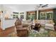 Open living space, perfect for entertaining, with access to a kitchen and sitting area at 3616 Deer Oak Cir, Oviedo, FL 32766