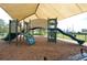 Community playground with slides and climbing structure at 3616 Deer Oak Cir, Oviedo, FL 32766