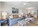 Comfortable living room featuring stylish furnishings, modern decor, and an open-concept layout at 3801 S Atlantic Ave # 114, New Smyrna Beach, FL 32169