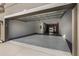 Open garage showing an empty space at 3893 Wind Dancer Cir, St Cloud, FL 34772
