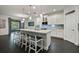 Stylish kitchen with a large center island and modern pendant lighting at 3893 Wind Dancer Cir, St Cloud, FL 34772
