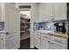 Pantry with ample shelving and storage space in a well-lit area at 3893 Wind Dancer Cir, St Cloud, FL 34772
