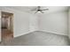 Neutral bedroom has closet and ceiling fan at 442 Big Black Pl, Kissimmee, FL 34759