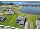 Picturesque aerial shot capturing a home near a tranquil lake, offering privacy and scenic views at 4512 Cutwater Dr, Orlando, FL 32820