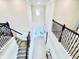 Grand entryway with wrought iron railings and a view of the front door at 4512 Cutwater Dr, Orlando, FL 32820